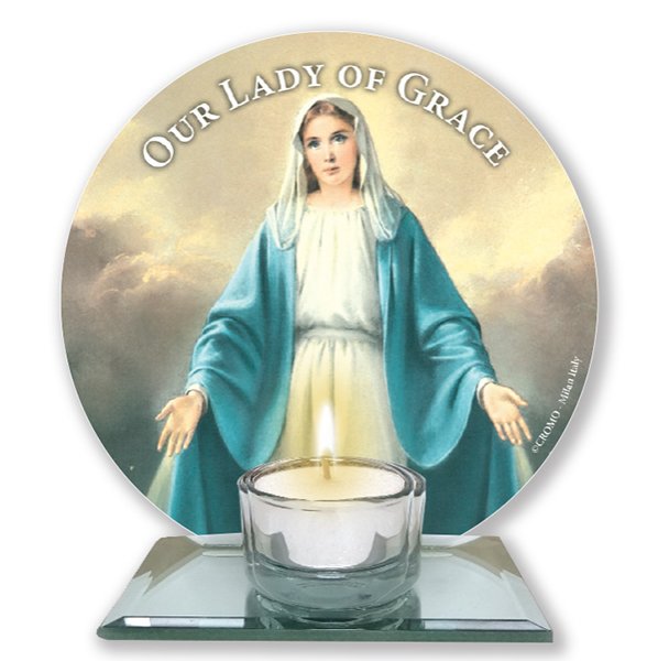 A glass votive light holder, with round image of the Our Lady of Grace.