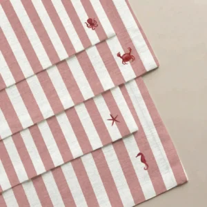 Pinkand cream napkins with ocean motifs